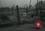 Image of debris in fence during dust bowl Dalhart Texas USA, 1937, second 50 stock footage video 65675032195