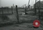 Image of debris in fence during dust bowl Dalhart Texas USA, 1937, second 58 stock footage video 65675032195
