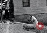 Image of people in rural area United States USA, 1935, second 40 stock footage video 65675032230