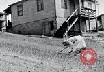 Image of people in rural area United States USA, 1935, second 46 stock footage video 65675032230