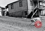 Image of people in rural area United States USA, 1935, second 48 stock footage video 65675032230