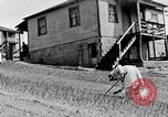 Image of people in rural area United States USA, 1935, second 59 stock footage video 65675032230