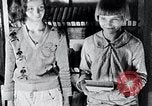 Image of people in rural area United States USA, 1935, second 27 stock footage video 65675032234