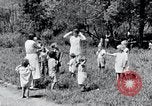 Image of people in rural area United States USA, 1935, second 58 stock footage video 65675032234