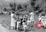 Image of people in rural area United States USA, 1935, second 62 stock footage video 65675032234