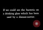 Image of disease causing micro-organisms and careless habits United States USA, 1922, second 44 stock footage video 65675032293