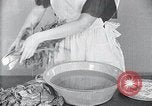 Image of preventing disease and cleansing raw food United States USA, 1922, second 34 stock footage video 65675032295