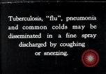 Image of disease causing bacteria sneezing or coughing United States USA, 1922, second 1 stock footage video 65675032296