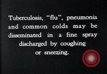 Image of disease causing bacteria sneezing or coughing United States USA, 1922, second 3 stock footage video 65675032296