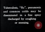Image of disease causing bacteria sneezing or coughing United States USA, 1922, second 5 stock footage video 65675032296
