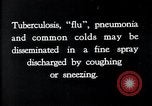 Image of disease causing bacteria sneezing or coughing United States USA, 1922, second 6 stock footage video 65675032296