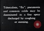 Image of disease causing bacteria sneezing or coughing United States USA, 1922, second 7 stock footage video 65675032296