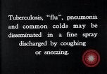 Image of disease causing bacteria sneezing or coughing United States USA, 1922, second 8 stock footage video 65675032296