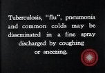 Image of disease causing bacteria sneezing or coughing United States USA, 1922, second 9 stock footage video 65675032296