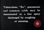 Image of disease causing bacteria sneezing or coughing United States USA, 1922, second 10 stock footage video 65675032296