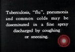 Image of disease causing bacteria sneezing or coughing United States USA, 1922, second 12 stock footage video 65675032296