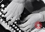 Image of hands performing various jobs late 1930s United States USA, 1937, second 5 stock footage video 65675032298