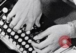 Image of hands performing various jobs late 1930s United States USA, 1937, second 7 stock footage video 65675032298