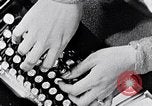 Image of hands performing various jobs late 1930s United States USA, 1937, second 8 stock footage video 65675032298