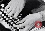 Image of hands performing various jobs late 1930s United States USA, 1937, second 10 stock footage video 65675032298
