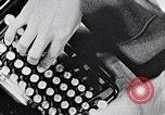 Image of hands performing various jobs late 1930s United States USA, 1937, second 12 stock footage video 65675032298