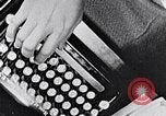 Image of hands performing various jobs late 1930s United States USA, 1937, second 13 stock footage video 65675032298