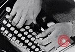 Image of hands performing various jobs late 1930s United States USA, 1937, second 15 stock footage video 65675032298