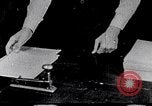 Image of hands performing various jobs late 1930s United States USA, 1937, second 17 stock footage video 65675032298