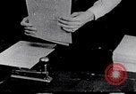 Image of hands performing various jobs late 1930s United States USA, 1937, second 18 stock footage video 65675032298