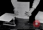 Image of hands performing various jobs late 1930s United States USA, 1937, second 19 stock footage video 65675032298