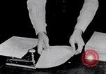 Image of hands performing various jobs late 1930s United States USA, 1937, second 20 stock footage video 65675032298