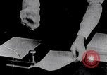 Image of hands performing various jobs late 1930s United States USA, 1937, second 21 stock footage video 65675032298