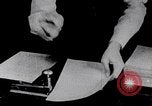 Image of hands performing various jobs late 1930s United States USA, 1937, second 22 stock footage video 65675032298