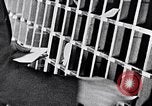 Image of hands performing various jobs late 1930s United States USA, 1937, second 32 stock footage video 65675032298