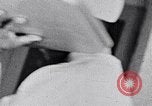 Image of hands performing various jobs late 1930s United States USA, 1937, second 41 stock footage video 65675032298