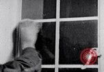Image of hands performing various jobs late 1930s United States USA, 1937, second 44 stock footage video 65675032298