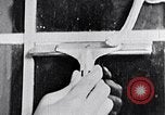 Image of hands performing various jobs late 1930s United States USA, 1937, second 51 stock footage video 65675032298