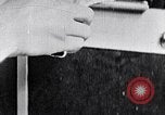 Image of hands performing various jobs late 1930s United States USA, 1937, second 53 stock footage video 65675032298