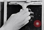Image of hands performing various jobs late 1930s United States USA, 1937, second 54 stock footage video 65675032298