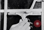 Image of hands performing various jobs late 1930s United States USA, 1937, second 58 stock footage video 65675032298