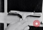 Image of hands performing various jobs late 1930s United States USA, 1937, second 59 stock footage video 65675032298