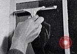 Image of hands performing various jobs late 1930s United States USA, 1937, second 61 stock footage video 65675032298
