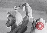 Image of Richmond Barthe sculpture of male and female dancing New York City USA, 1937, second 4 stock footage video 65675032303