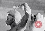 Image of Richmond Barthe sculpture of male and female dancing New York City USA, 1937, second 5 stock footage video 65675032303