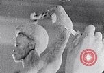 Image of Richmond Barthe sculpture of male and female dancing New York City USA, 1937, second 32 stock footage video 65675032303