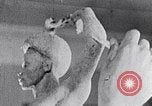 Image of Richmond Barthe sculpture of male and female dancing New York City USA, 1937, second 33 stock footage video 65675032303