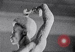 Image of Richmond Barthe sculpture of male and female dancing New York City USA, 1937, second 52 stock footage video 65675032303