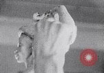 Image of Richmond Barthe sculpture of male and female dancing New York City USA, 1937, second 60 stock footage video 65675032303