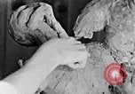 Image of Richmond Barthe designing sculpture New York City USA, 1937, second 28 stock footage video 65675032304