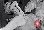 Image of Richmond Barthe designing sculpture New York City USA, 1937, second 32 stock footage video 65675032304